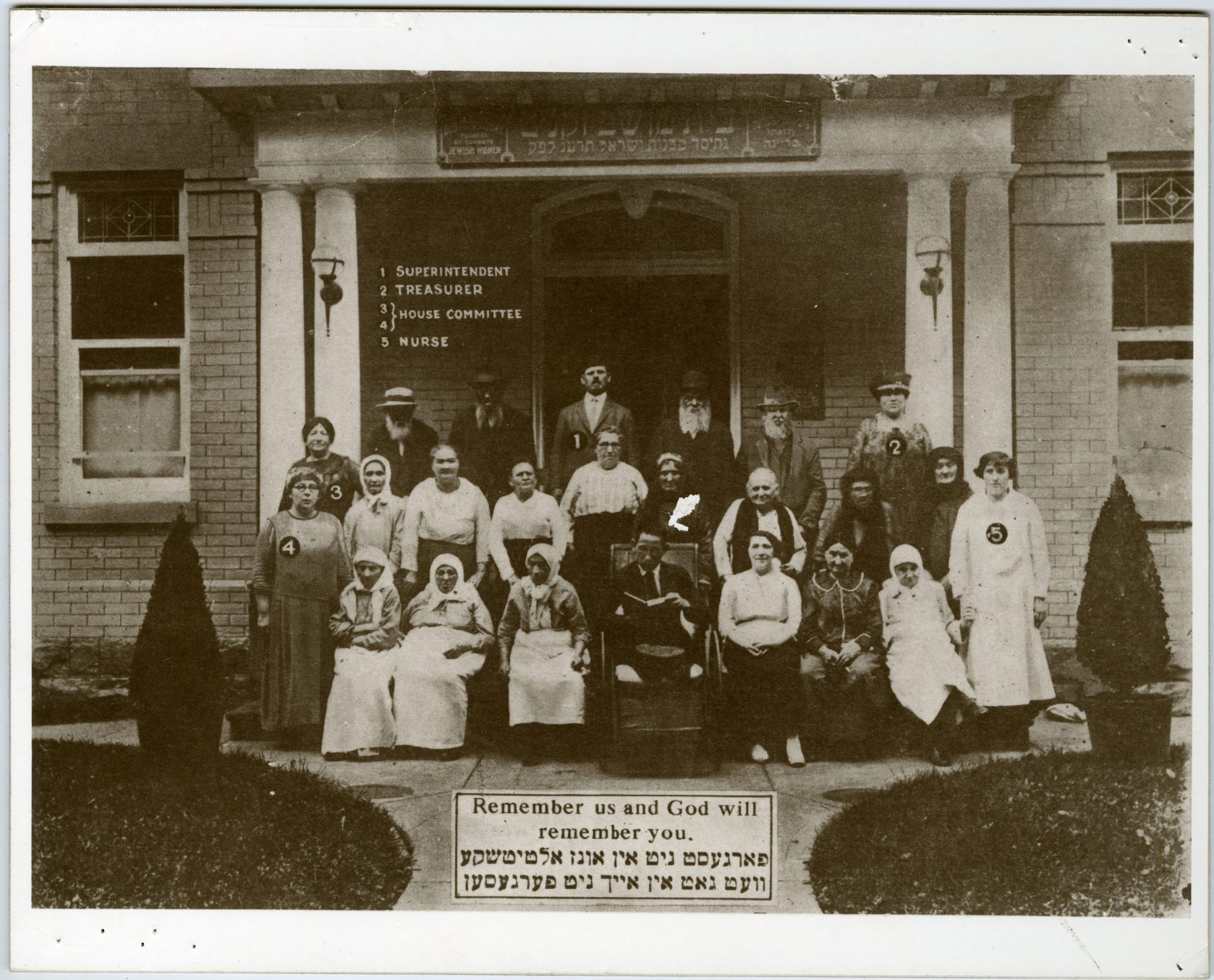Residents and staff gathered in front of the Jewish Old Folks' Home on Cecil Street. On the upper-left side of the photo there is a legend to identify the superintendent, treasurer, house committee, and nurse at the home. [ca. 1925].

OJA, fonds 14, series 6, item 2.

